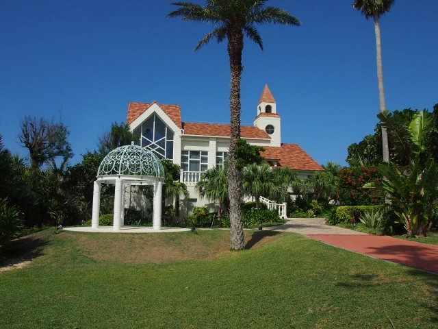 okinawa wedding chapel with tropical garden and blue sky